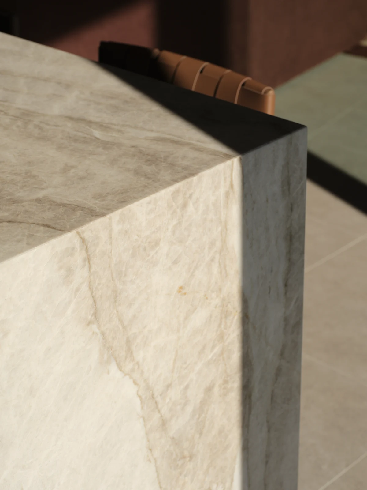 Close view of the mitred corner and pale veining of the Taj Mahal stone island